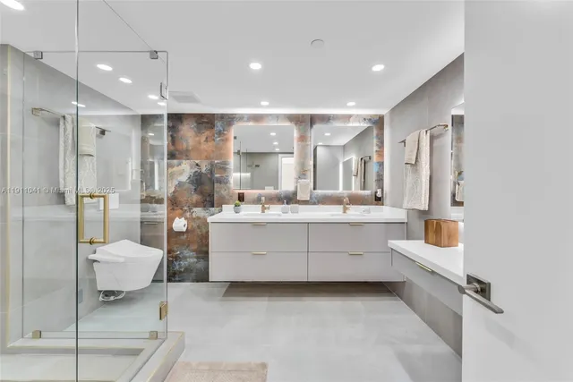 a kitchen with stainless steel appliances wooden floor dining table and chairs