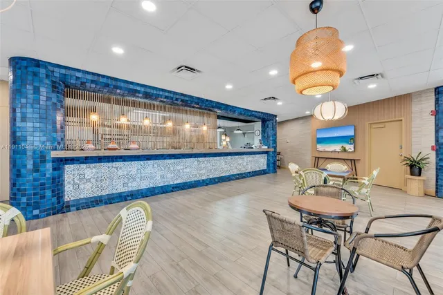 a view of a balcony with chairs