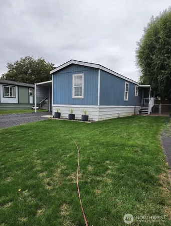 a house view with a garden space