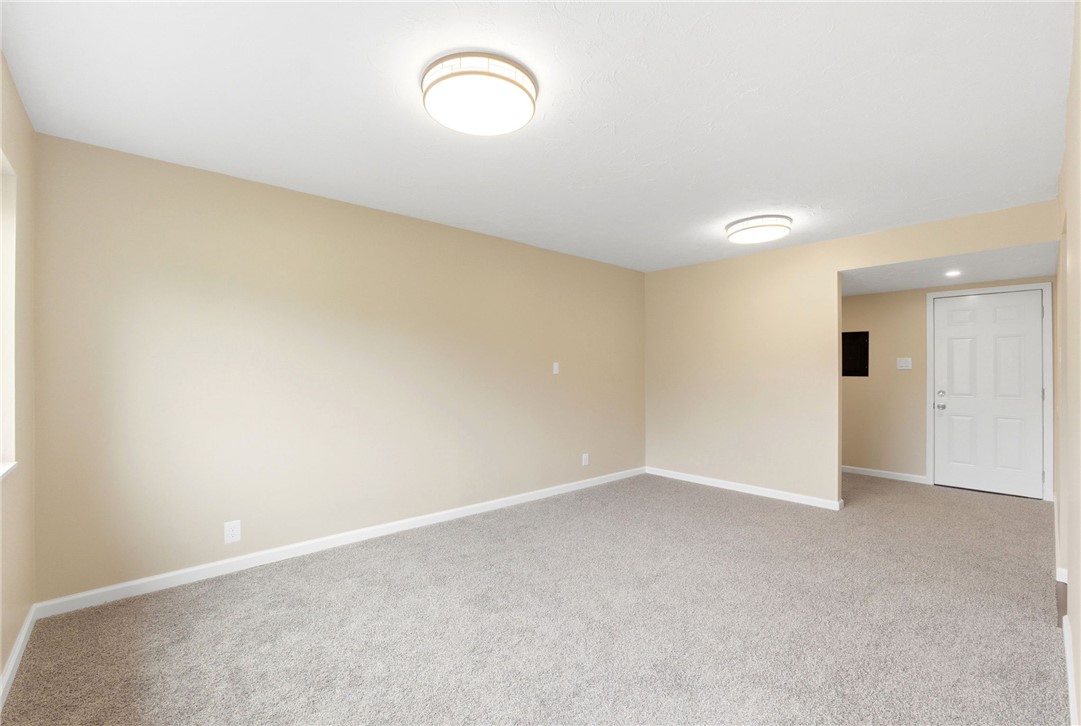 40 Woods Road Springboro, OH 45066 - Photo 31 of 57 This versatile room offers plush carpeting and ample space, ready for your personalized design touches.