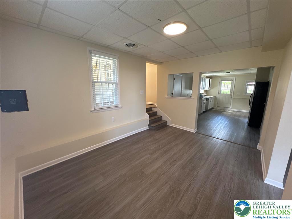 3676 Lower Saucon Road Hellertown, PA 18055 - Photo 13 of 20 an empty room with wooden floor and windows
