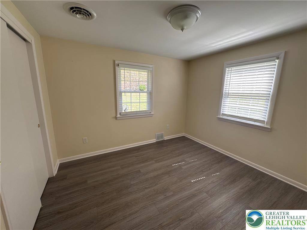 3676 Lower Saucon Road Hellertown, PA 18055 - Photo 15 of 20 a view of an empty room with wooden floor and a window