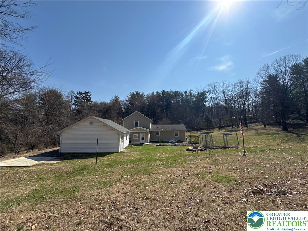 3676 Lower Saucon Road Hellertown, PA 18055 - Photo 5 of 20 a view of a house with a yard