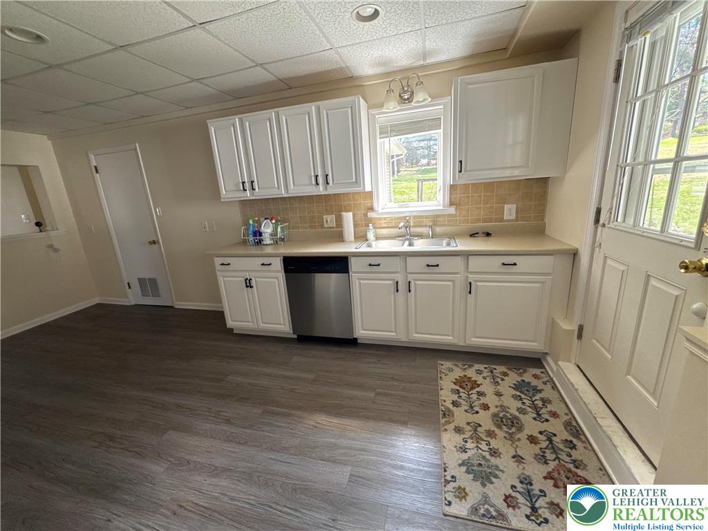 3676 Lower Saucon Road Hellertown, PA 18055 - Photo 6 of 20 a kitchen with sink a stove and cabinets