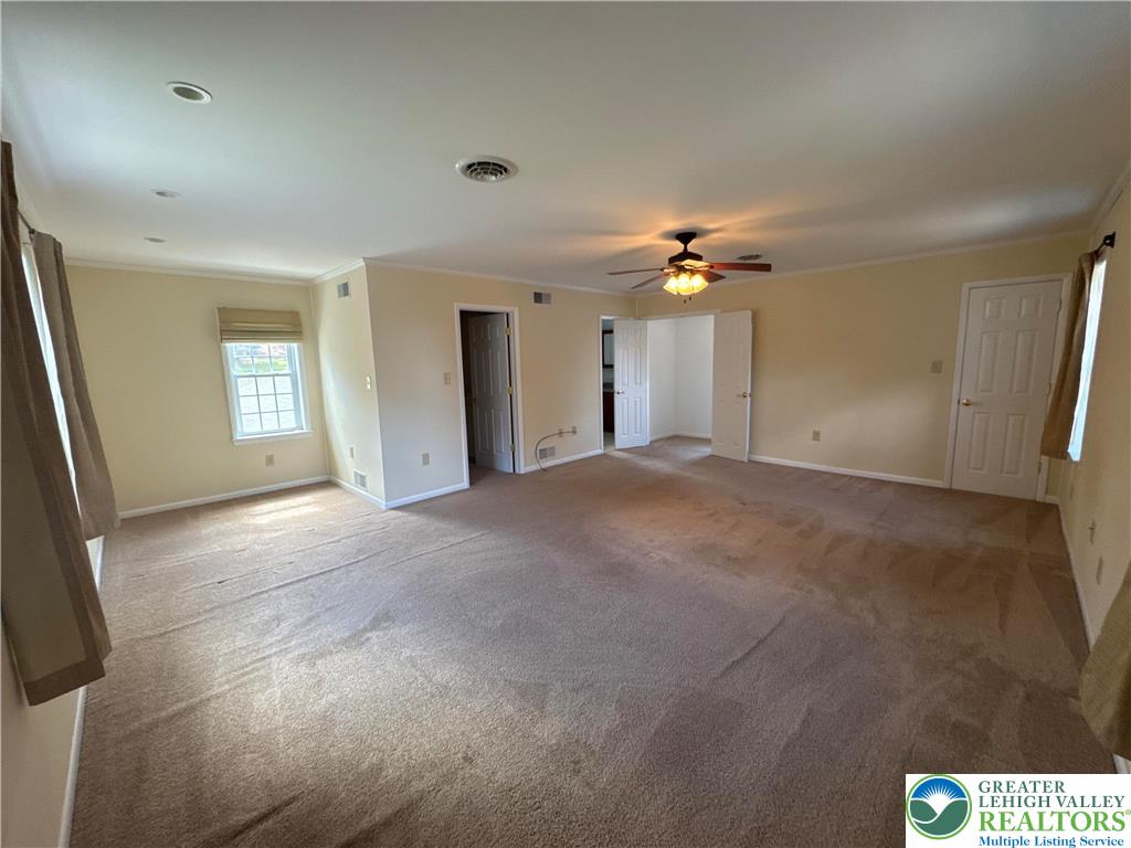 3676 Lower Saucon Road Hellertown, PA 18055 - Photo 10 of 20 a view of a hallway with a chandelier
