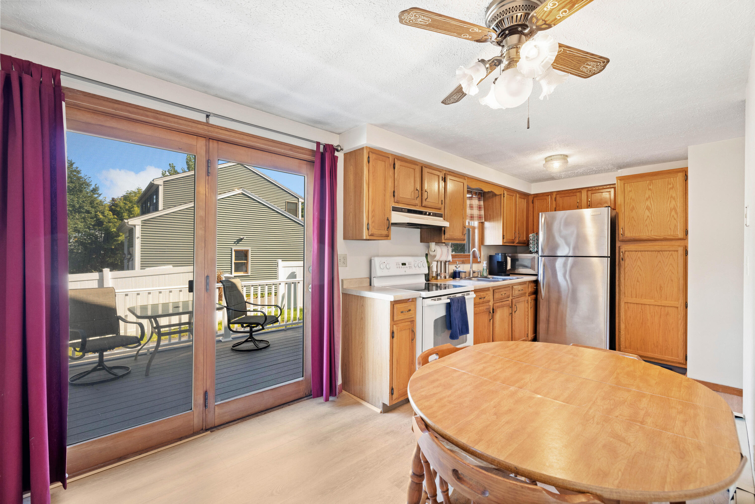 77 Maple Street, Unit 2 Saco, ME 04072 - Photo 5 of 31 Dining area from deck