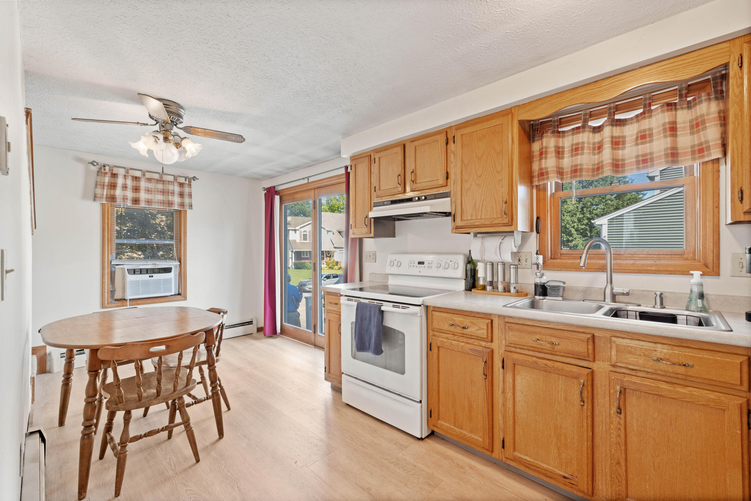 77 Maple Street, Unit 2 Saco, ME 04072 - Photo 10 of 31 Kitchen over looking back yard