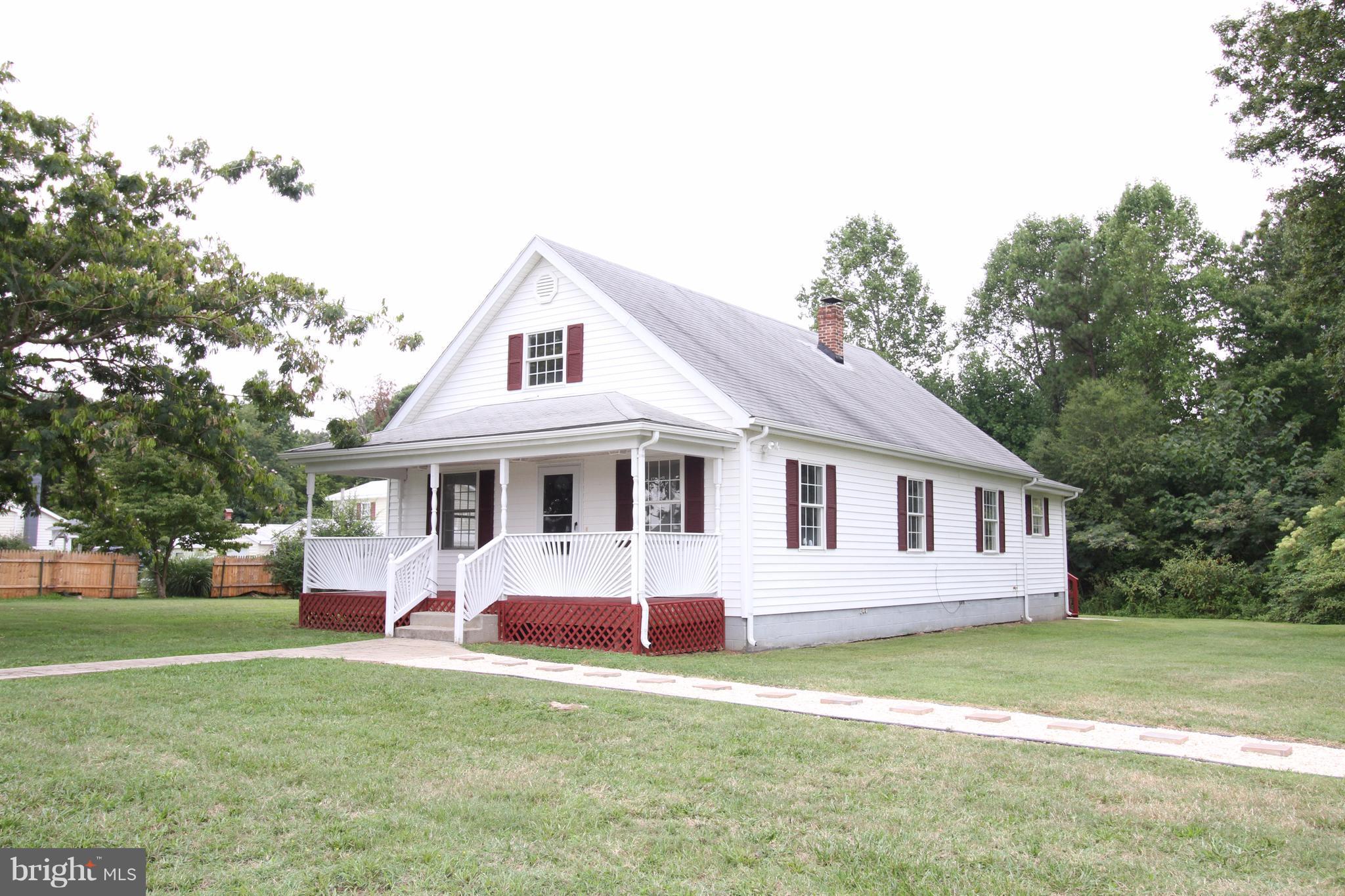 7124 Margo Road Spotsylvania, VA 22551 - Photo 1 of 30 Charming outside with path to front door and mail