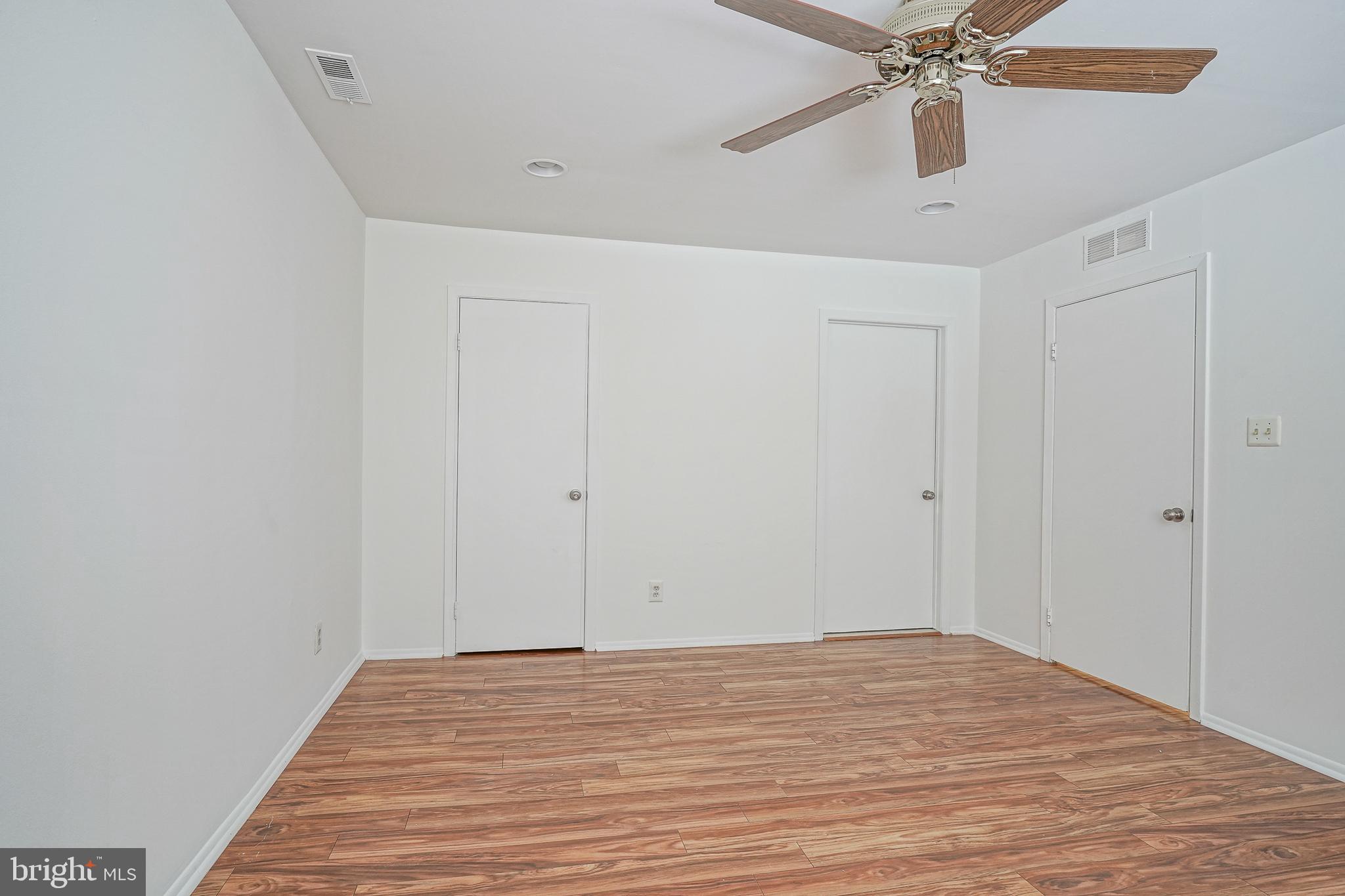 2012 Raven's Row Marlton, NJ 08053 - Photo 18 of 23 a view of a room with a ceiling fan and wooden floor