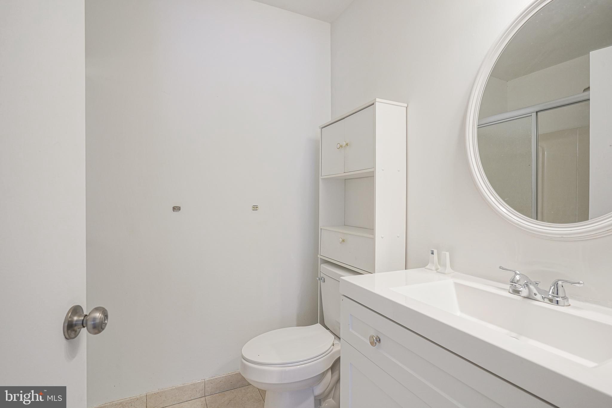2012 Raven's Row Marlton, NJ 08053 - Photo 21 of 23 a bathroom with a granite countertop sink mirror vanity and toilet