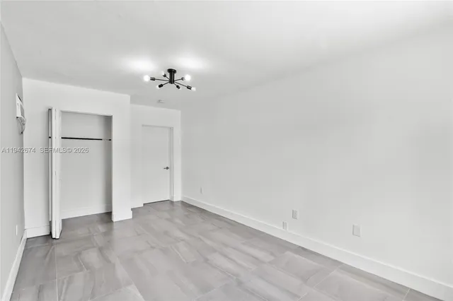 a kitchen with stainless steel appliances a stove and a refrigerator
