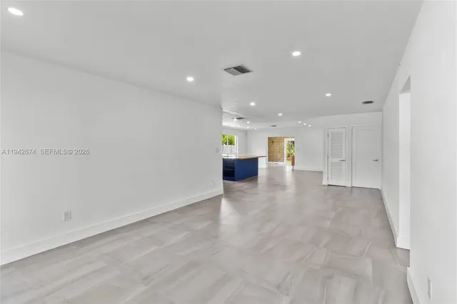 an empty room with an entryway