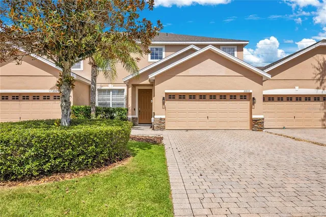a living room with furniture fireplace and a flat screen tv