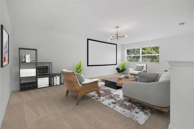 an aerial view of residential houses with outdoor space and swimming pool