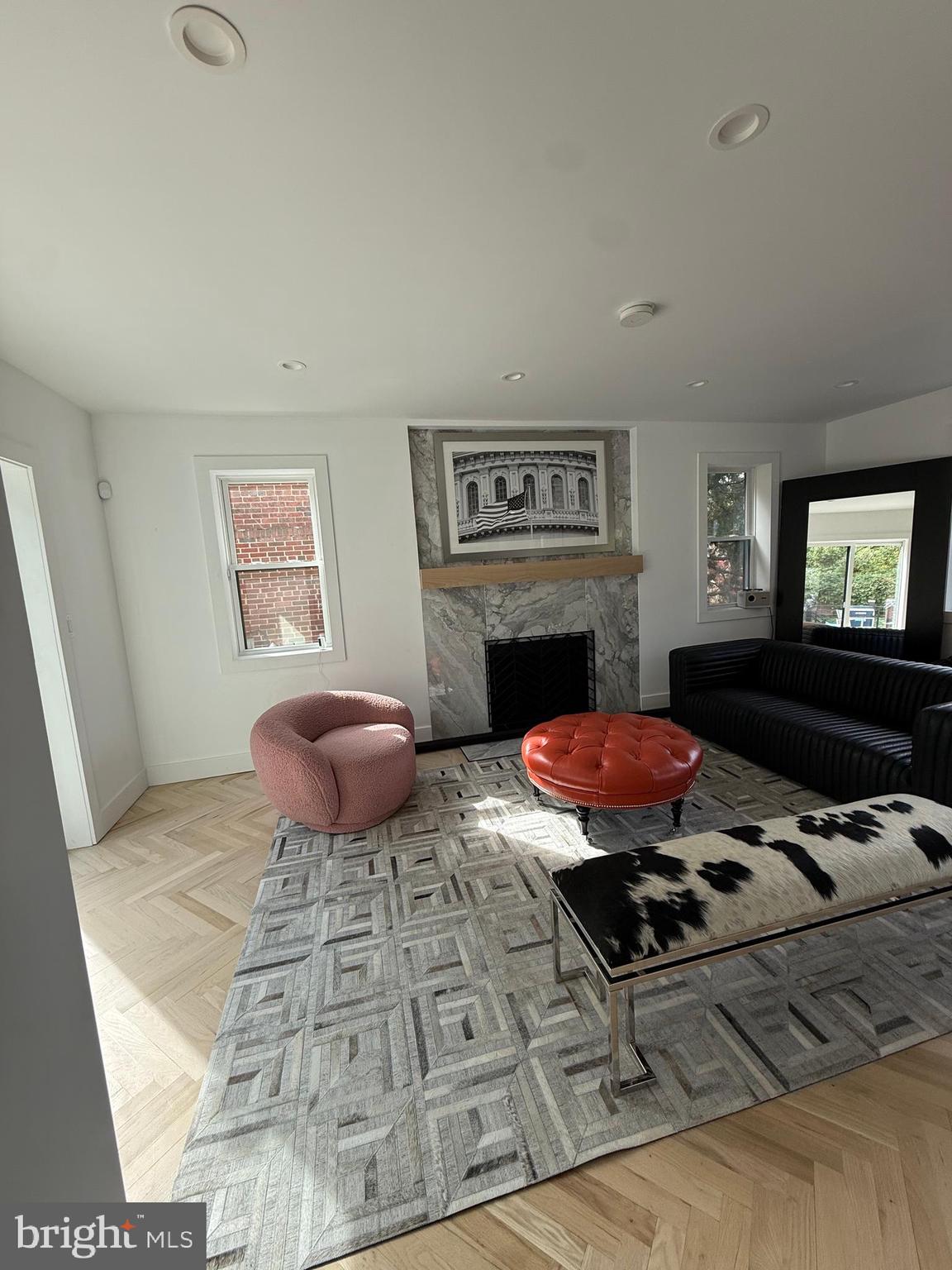 3323 Carpenter Street Southeast Washington, DC 20020 - Photo 4 of 34 a living room with furniture and a fireplace
