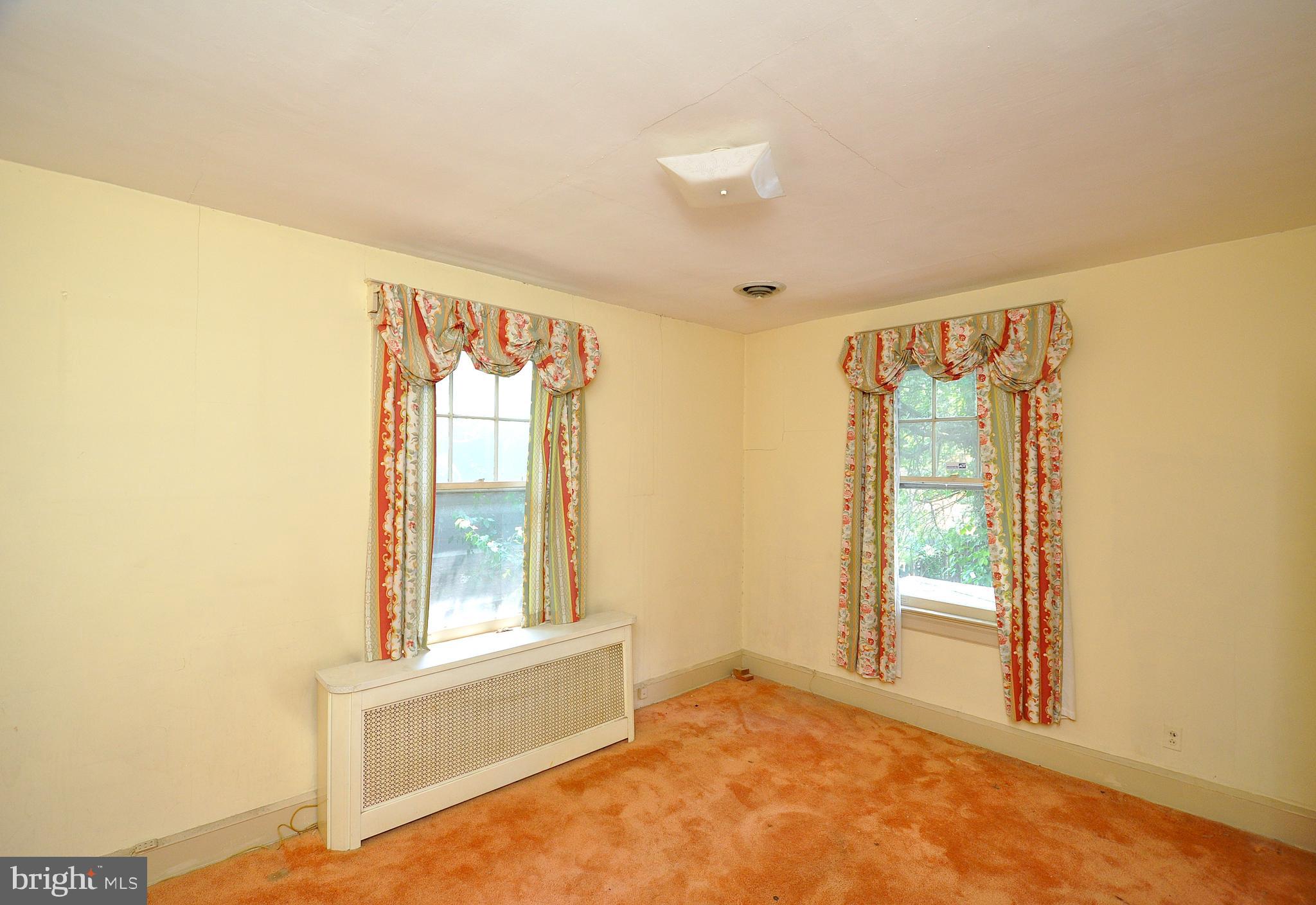 1619 Evarts Street Northeast Washington, DC 20018 - Photo 12 of 20 a view of an empty room with a window