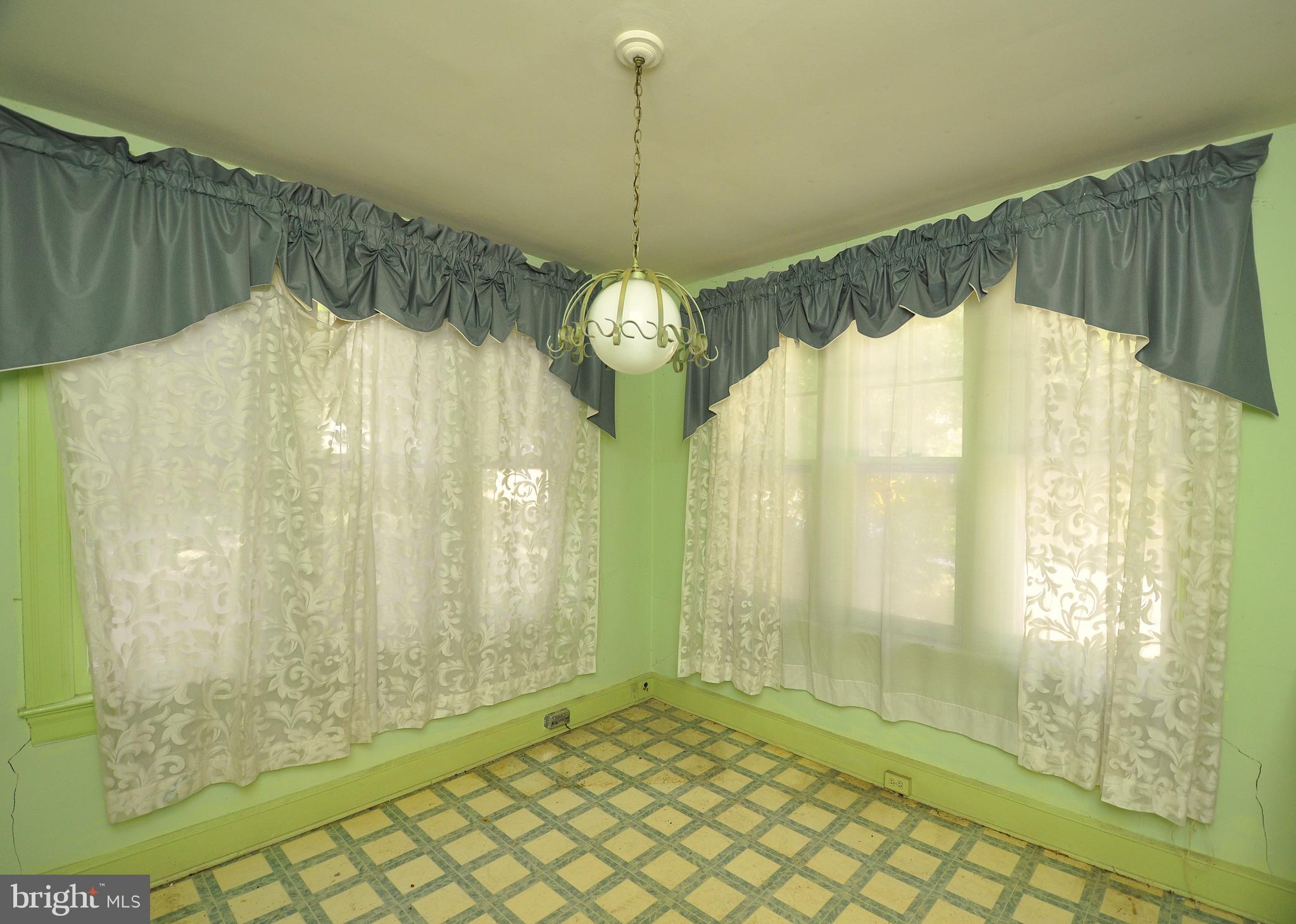 1619 Evarts Street Northeast Washington, DC 20018 - Photo 8 of 20 a bathroom with a shower and a bathtub