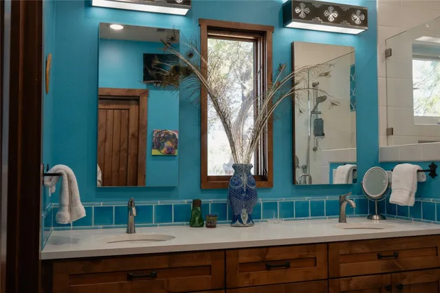 a kitchen with stainless steel appliances a stove sink and cabinets
