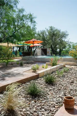 a view of a house with a yard porch and sitting area