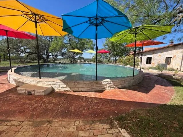 a view of a yard with ocean view