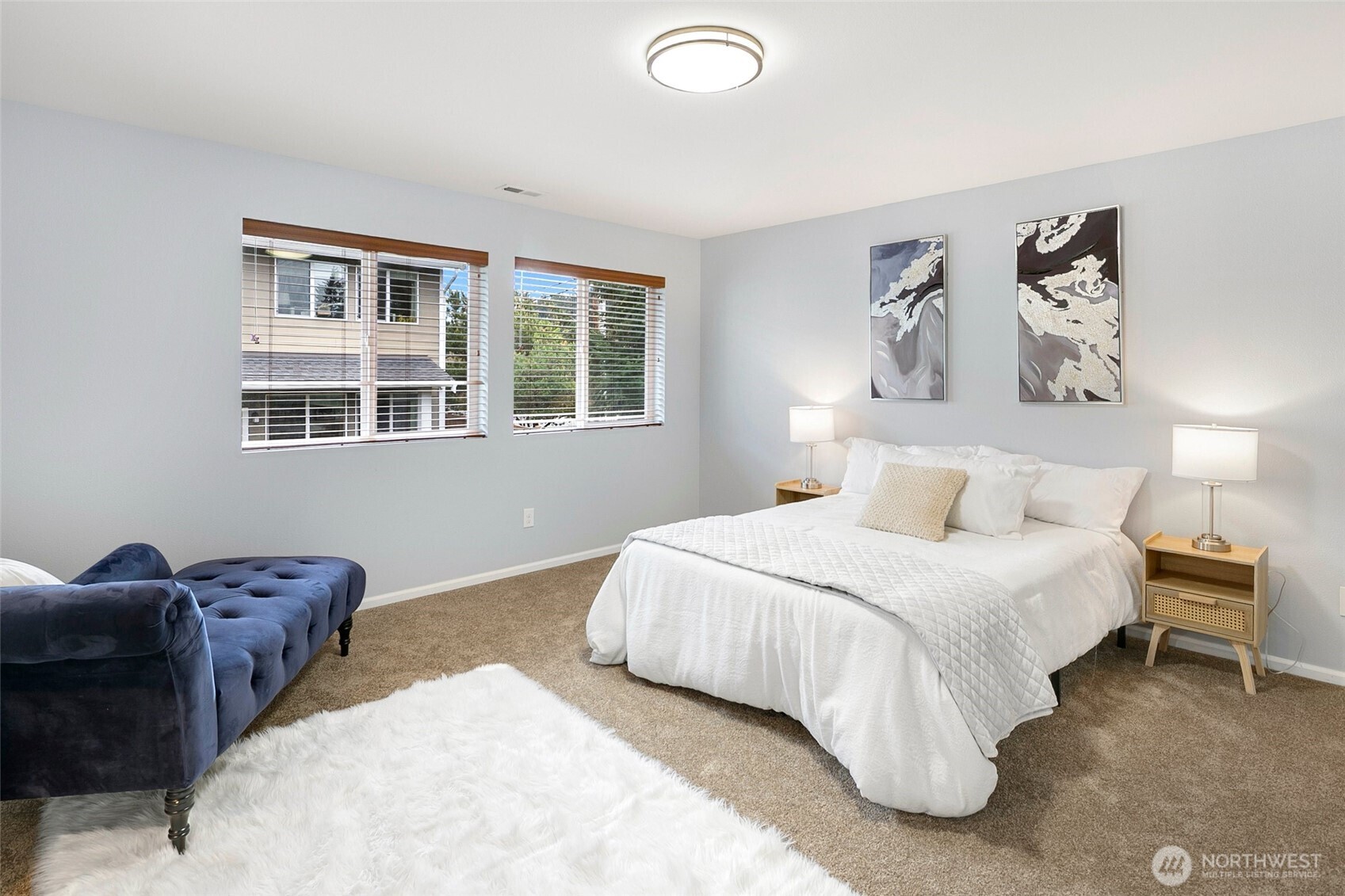 3931 177th Street Southeast Bothell, WA 98012 - Photo 19 of 39 a bedroom with a bed and wooden floor