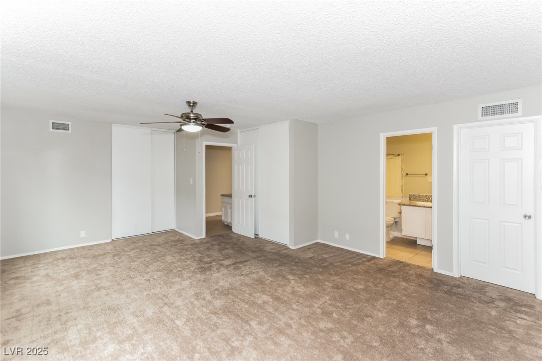 4737 Monaco Road Las Vegas, NV 89121 - Photo 13 of 21 Unfurnished room with carpet flooring, a ceiling f