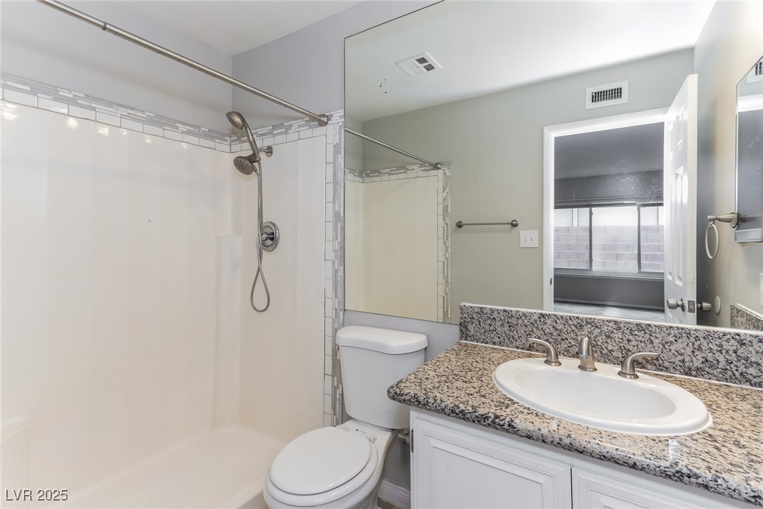4737 Monaco Road Las Vegas, NV 89121 - Photo 15 of 21 Full bathroom with a shower and vanity