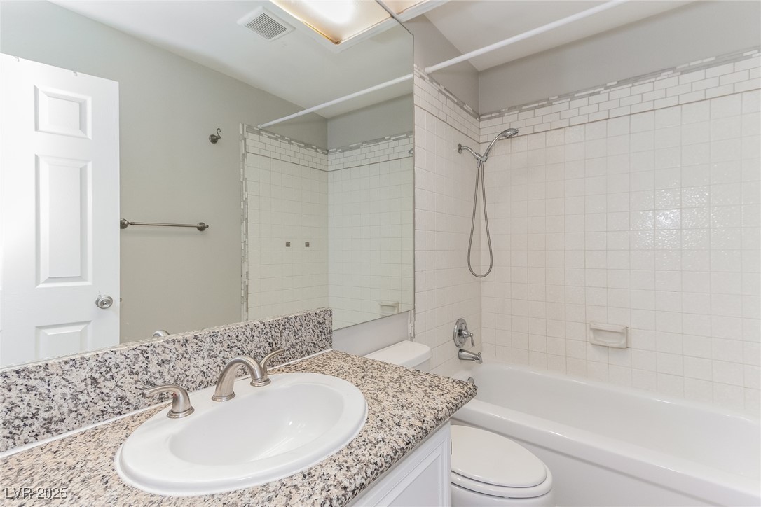 4737 Monaco Road Las Vegas, NV 89121 - Photo 18 of 21 Bathroom with vanity and bathtub / shower combinat