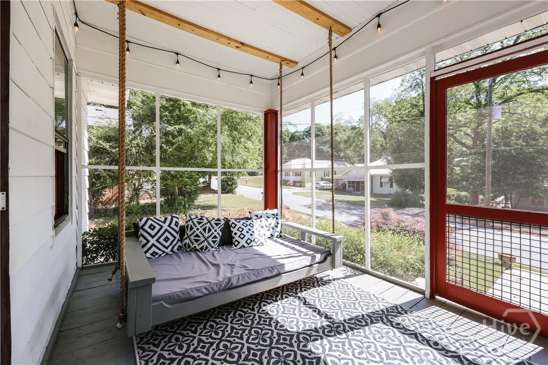 185 First Street Athens, GA 30601 - Photo 2 of 44 Front screened porch with bed swing