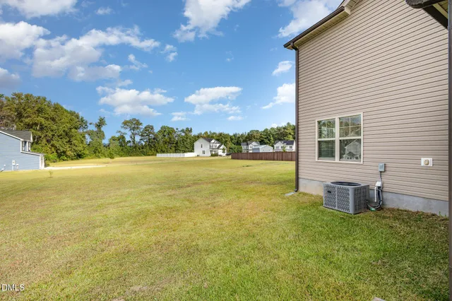 a view of a house with a ocean view