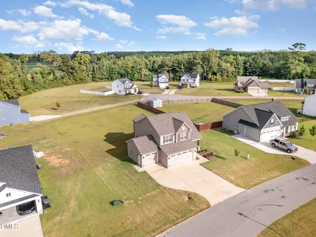a view of a swimming pool with an outdoor seating