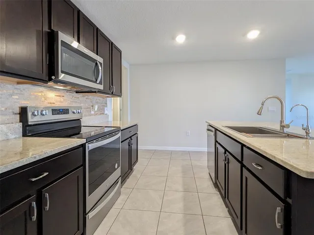 a view of house with a swimming pool
