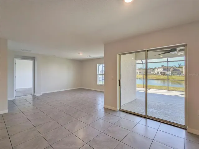 a view of a swimming pool with a yard