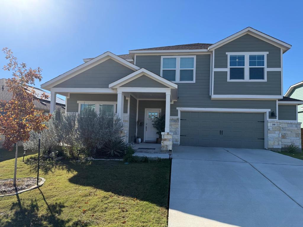 380 Mendoza Kyle, TX 78640 - Photo 1 of 28 a front view of a house with garden