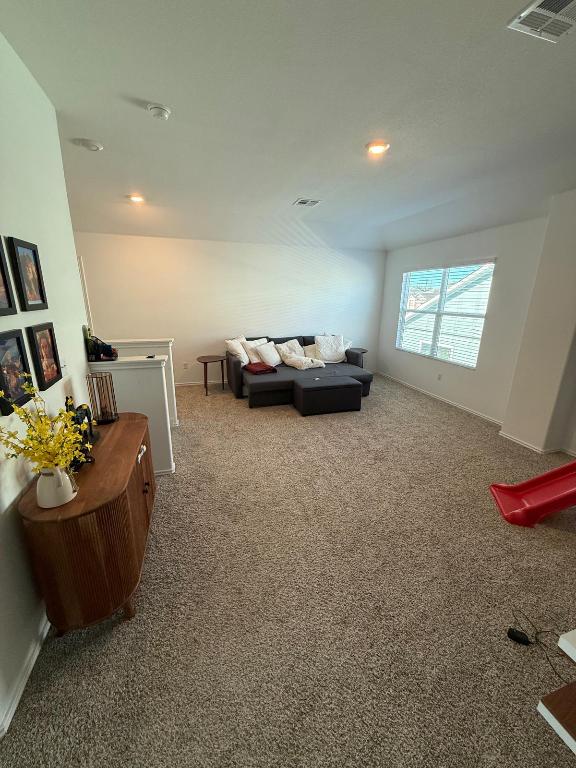 380 Mendoza Kyle, TX 78640 - Photo 13 of 28 a living room with furniture and a couch