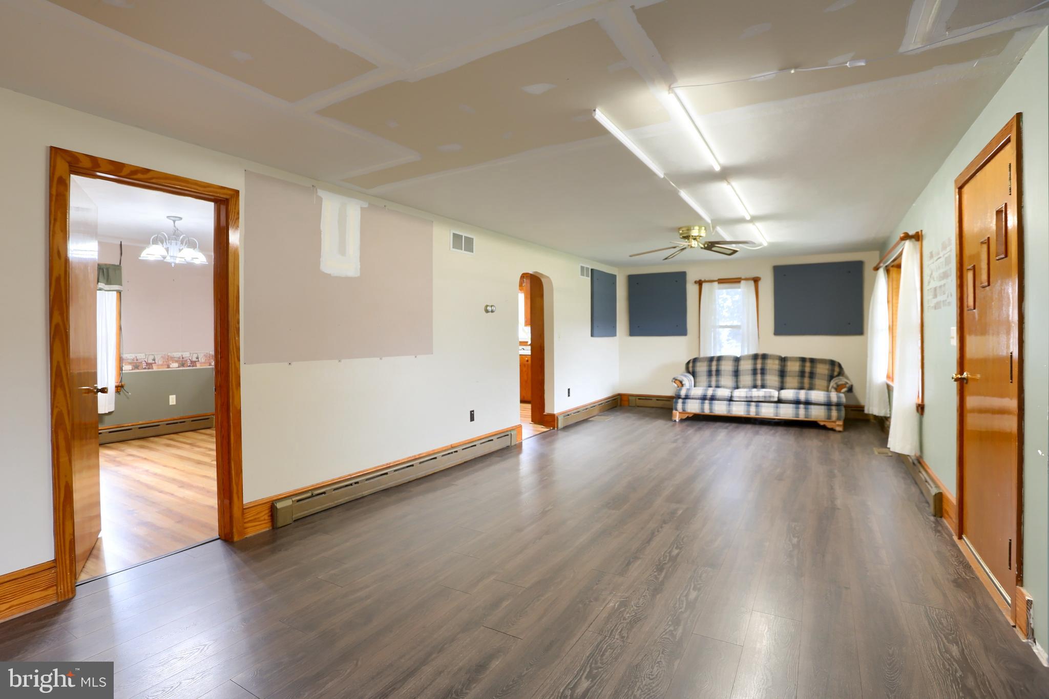 858 Main Street Richfield, PA 17086 - Photo 11 of 29 a view of a livingroom with furniture and an entryway