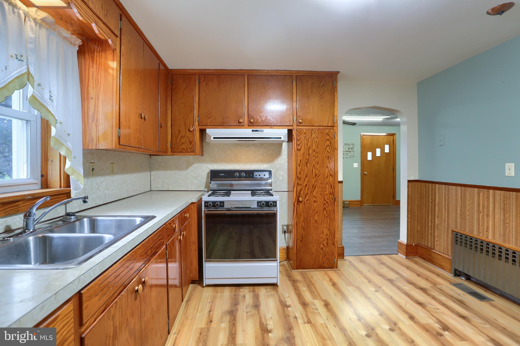 858 Main Street Richfield, PA 17086 - Photo 16 of 29 a kitchen with stainless steel appliances granite countertop a sink and a stove