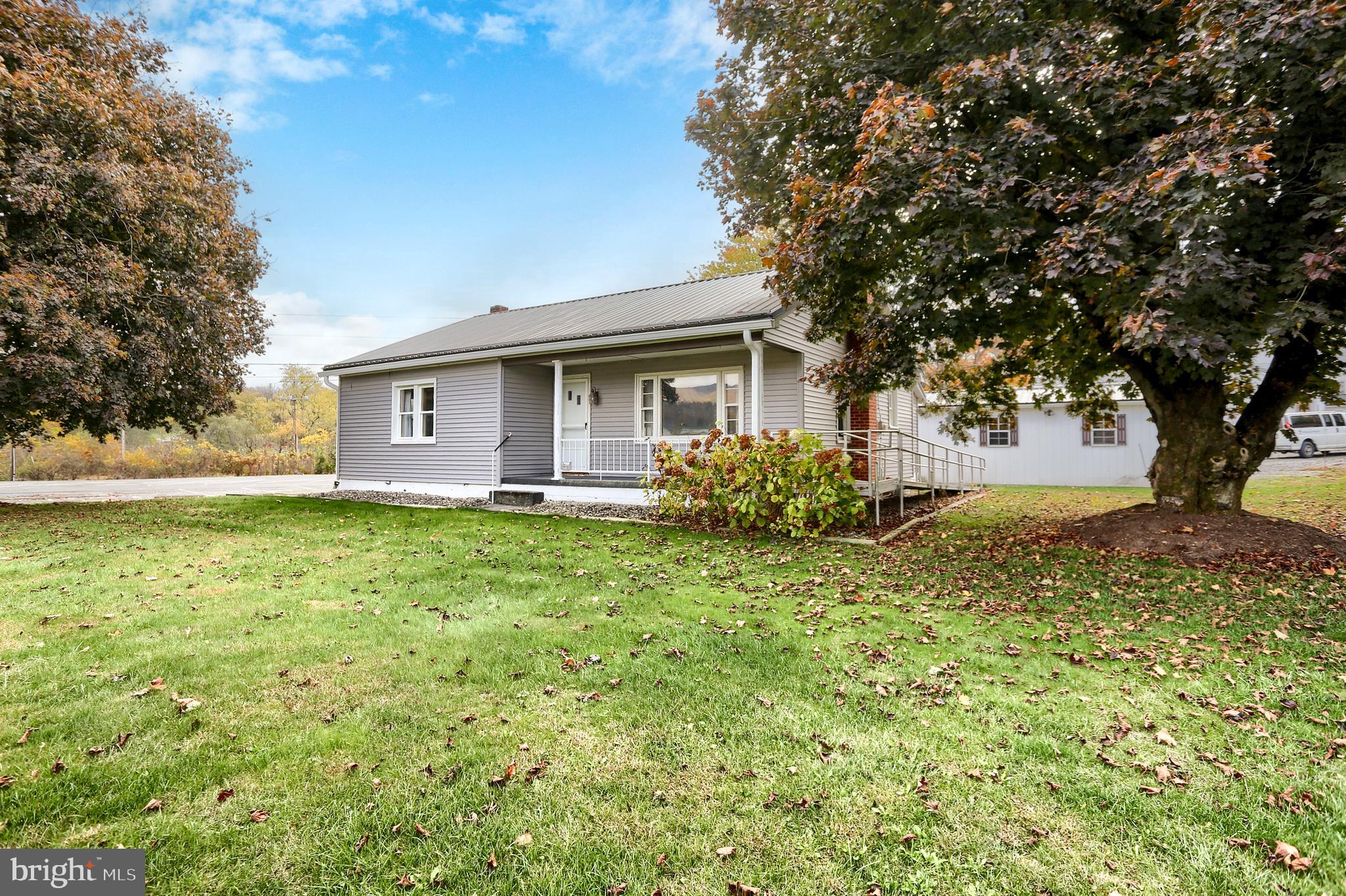 858 Main Street Richfield, PA 17086 - Photo 2 of 29 a front view of house with yard and trees