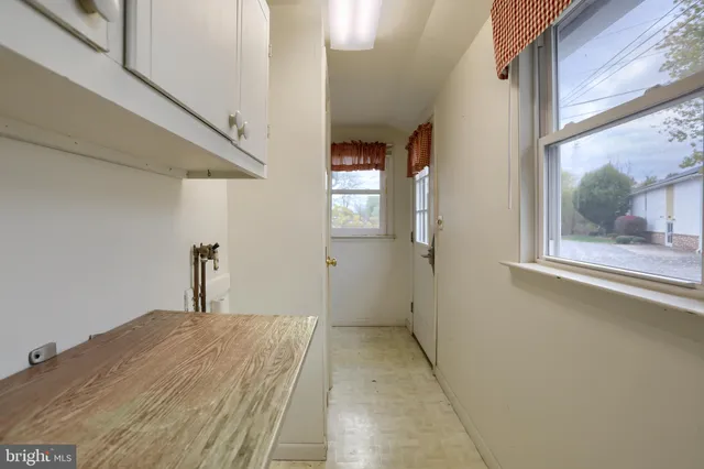 a room that has a bed and a window