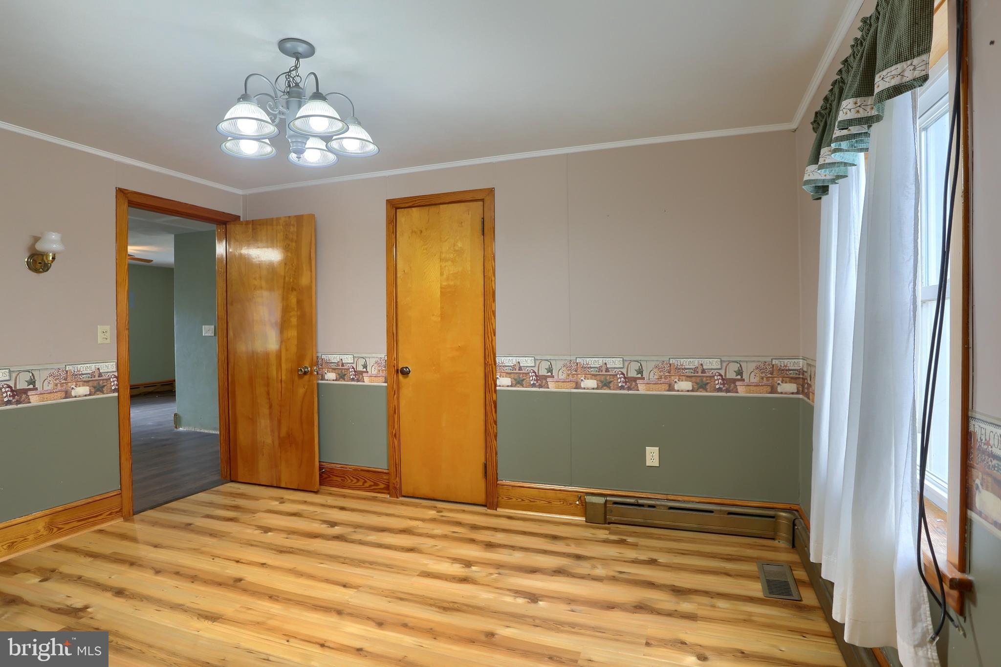 858 Main Street Richfield, PA 17086 - Photo 22 of 29 a view of a livingroom with a chandelier