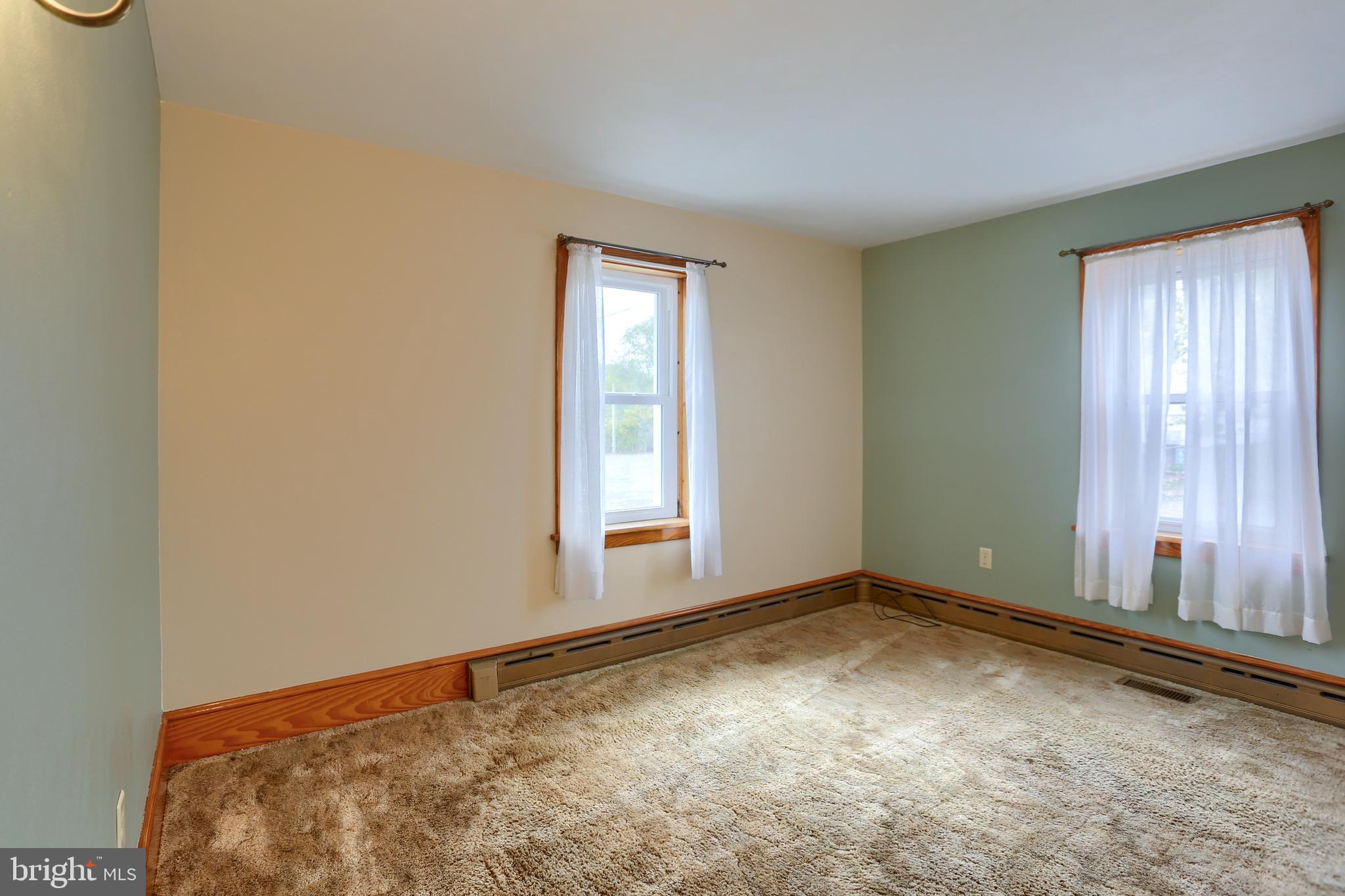 858 Main Street Richfield, PA 17086 - Photo 25 of 29 an empty room with windows