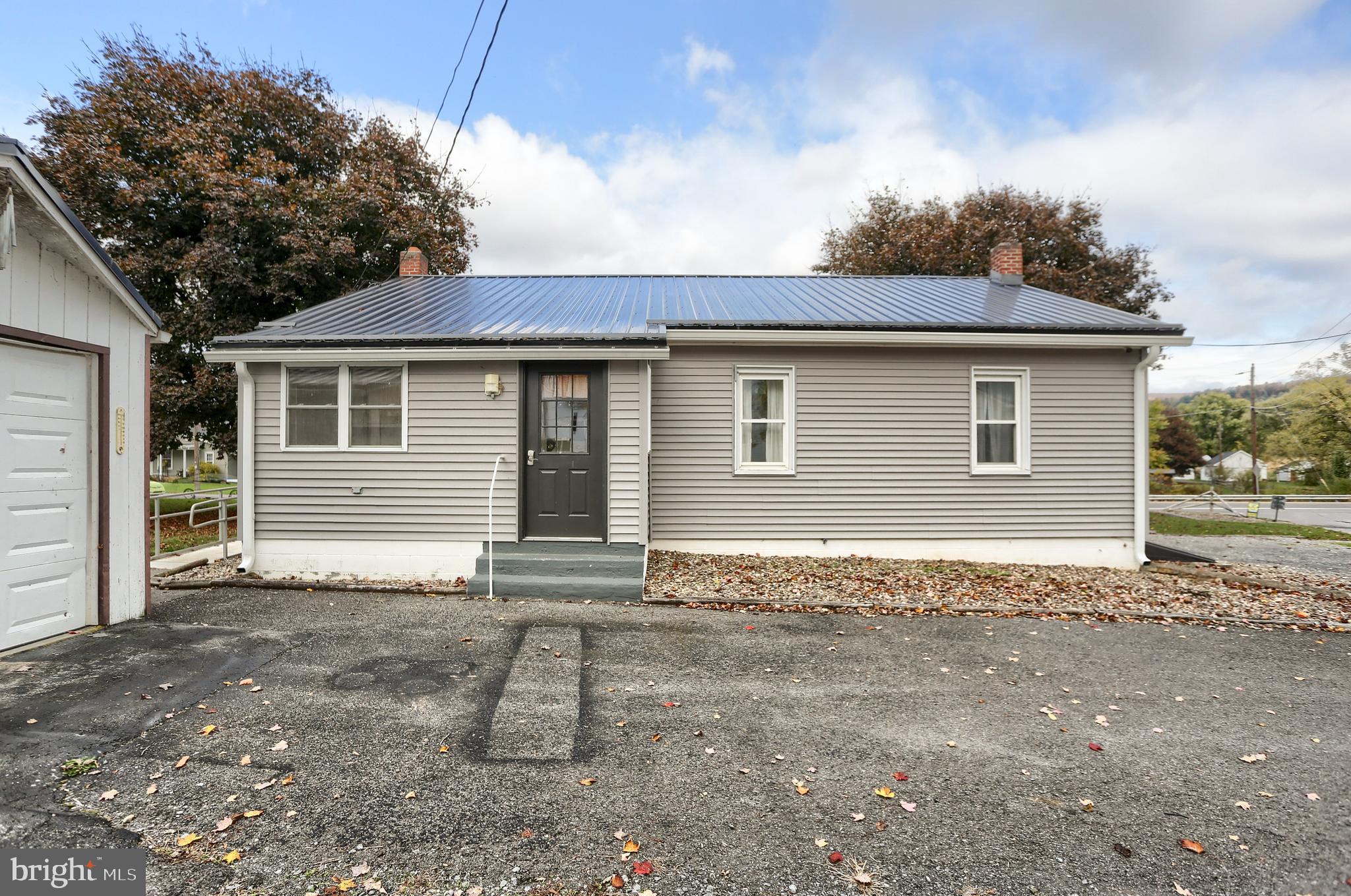 858 Main Street Richfield, PA 17086 - Photo 5 of 29 a view of a house with a yard