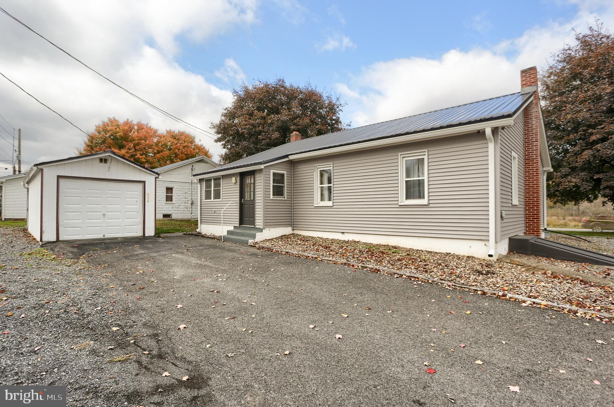 858 Main Street Richfield, PA 17086 - Photo 6 of 29 a view of a house with a backyard