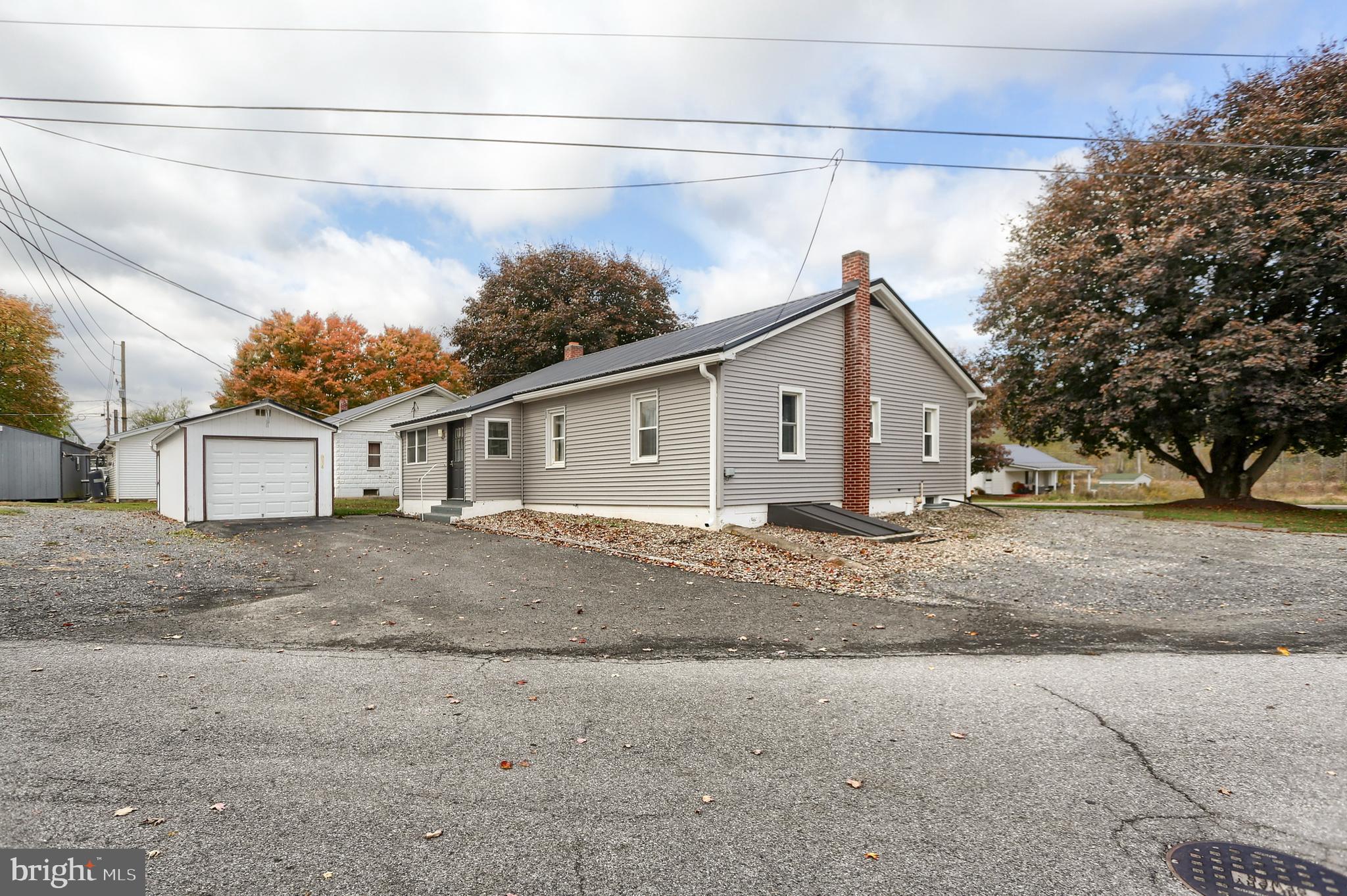 858 Main Street Richfield, PA 17086 - Photo 7 of 29 a view of a house with a road