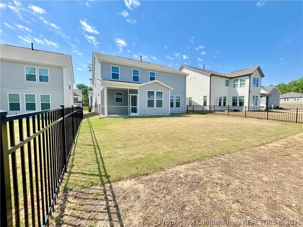 a view of a house with a swimming pool