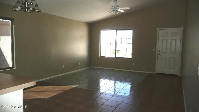 1311 West Vineyard Road Phoenix, AZ 85041 - Photo 2 of 8 living room 2