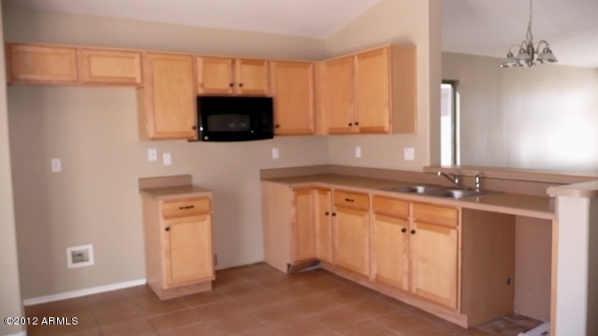 1311 West Vineyard Road Phoenix, AZ 85041 - Photo 6 of 8 kitchen