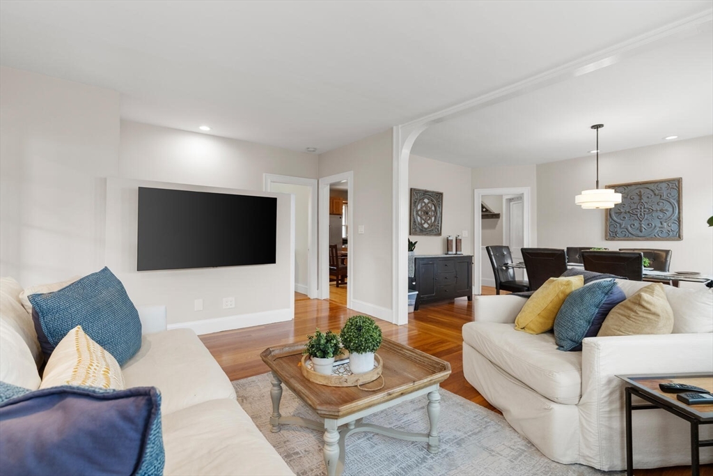35 Richardson Street, Unit 2 Wakefield, MA 01880 - Photo 18 of 32 a living room with furniture and a flat screen tv
