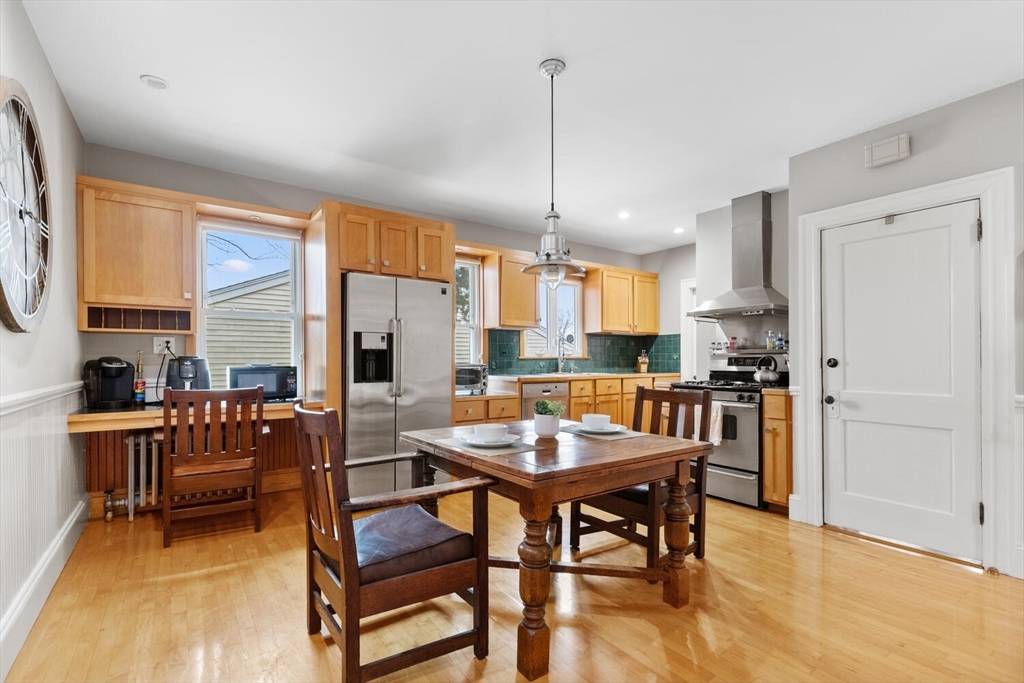 35 Richardson Street, Unit 2 Wakefield, MA 01880 - Photo 6 of 32 a view of a dining room with furniture window and wooden floor