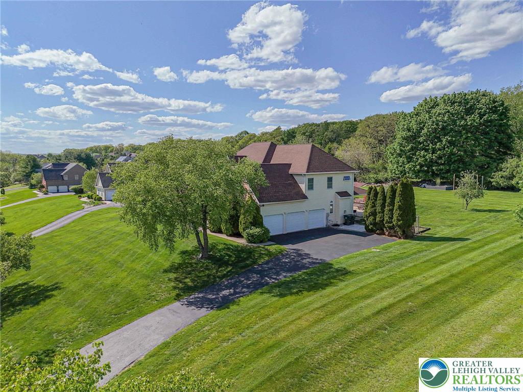 6551 Overlook Road Orefield, PA 18069 - Photo 71 of 82 a view of a big house with a big yard